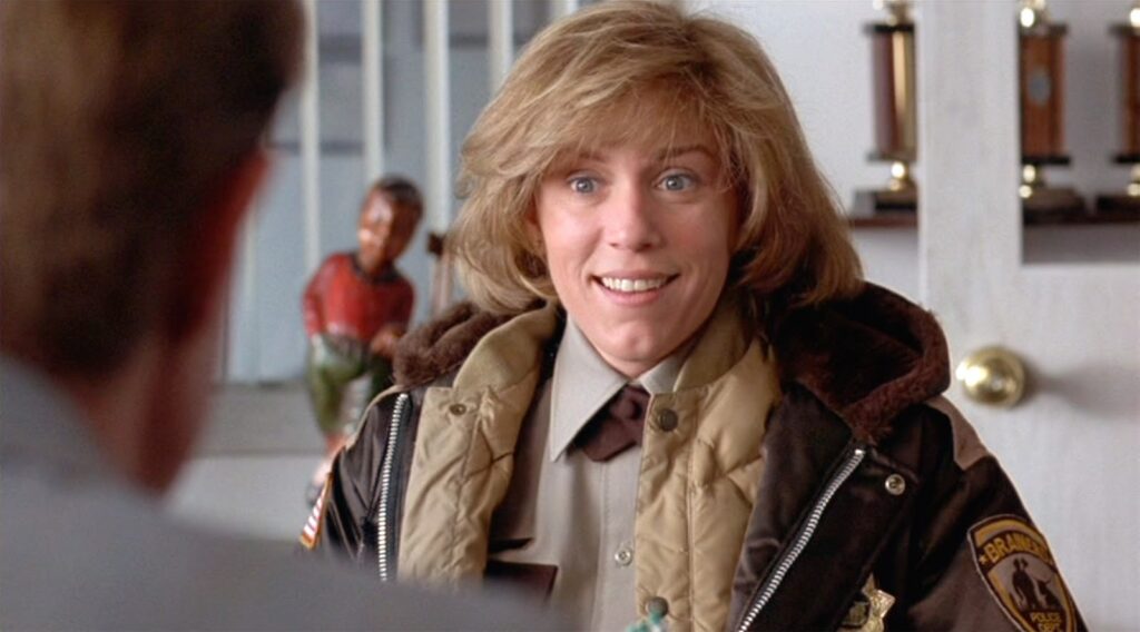 Marge Gunderson durante il colloquio con Jerry Lundegaard in una scena di Fargo (1996).