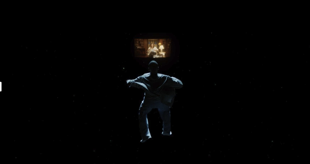 Chris sospeso nel buio, con Missy visibile in un lontano riquadro luminoso, in Scappa – Get Out (2017).